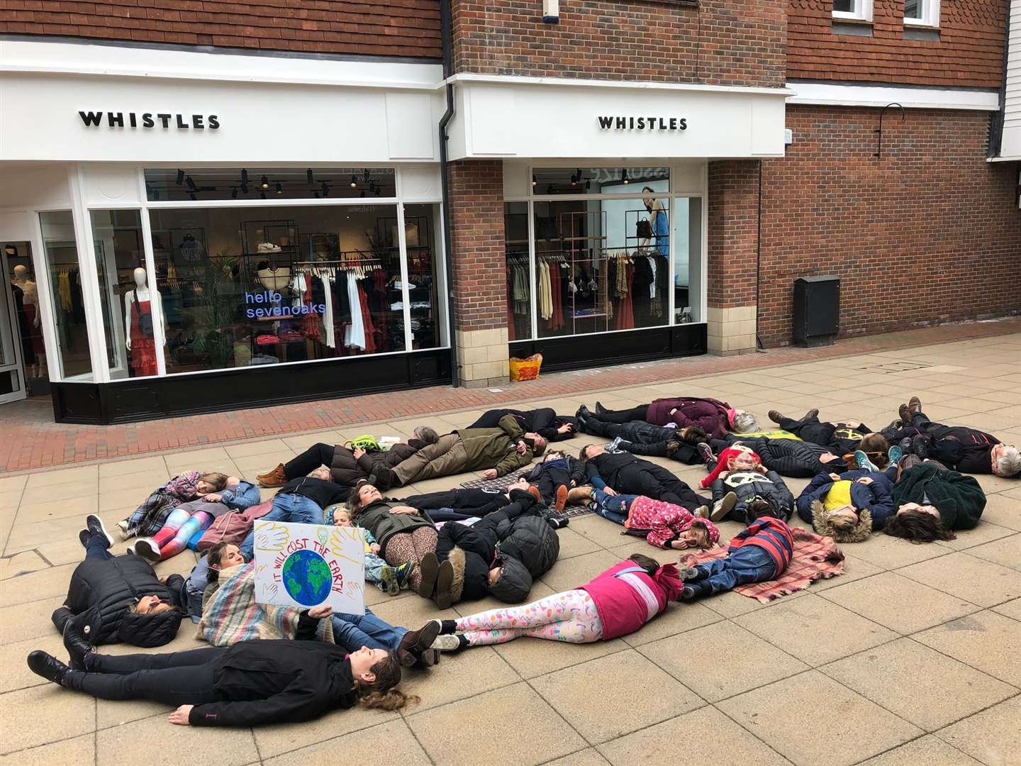 Extinction Rebellion protesters held a die-in in Bligh's Court, Sevenoaks. Picture: Giles Winser (9247019)