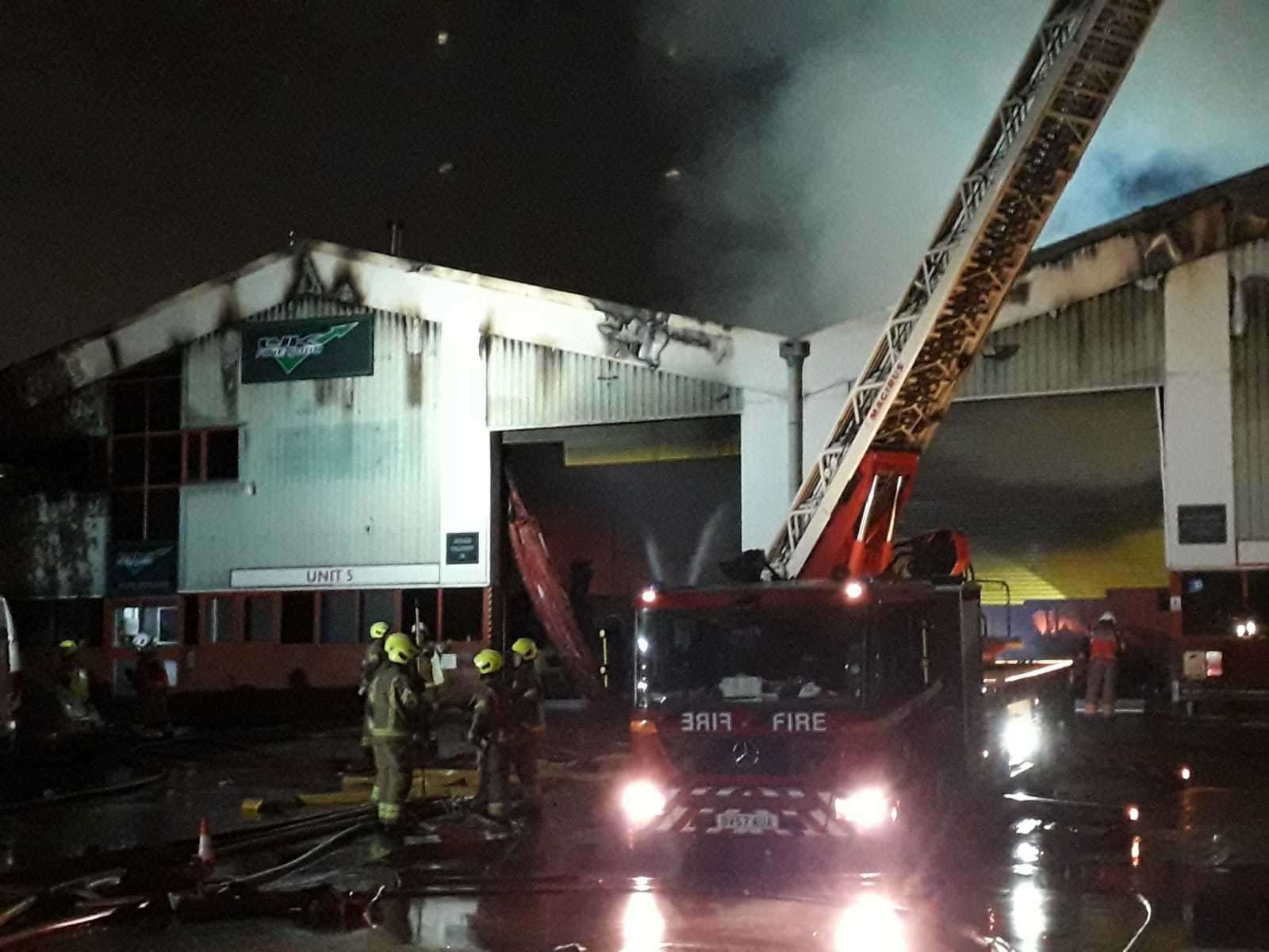 Fire crews remained at the scene to dampen it down Picture: London Fire Brigade