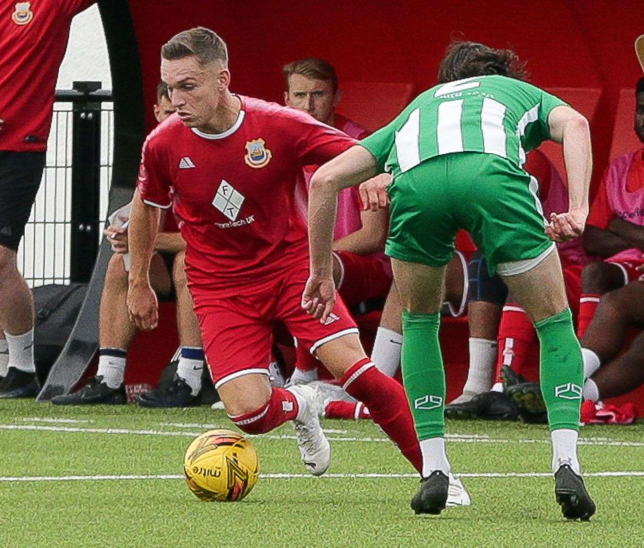 Whitstable’s Josh Oliver turns away from danger. Picture: Les Biggs