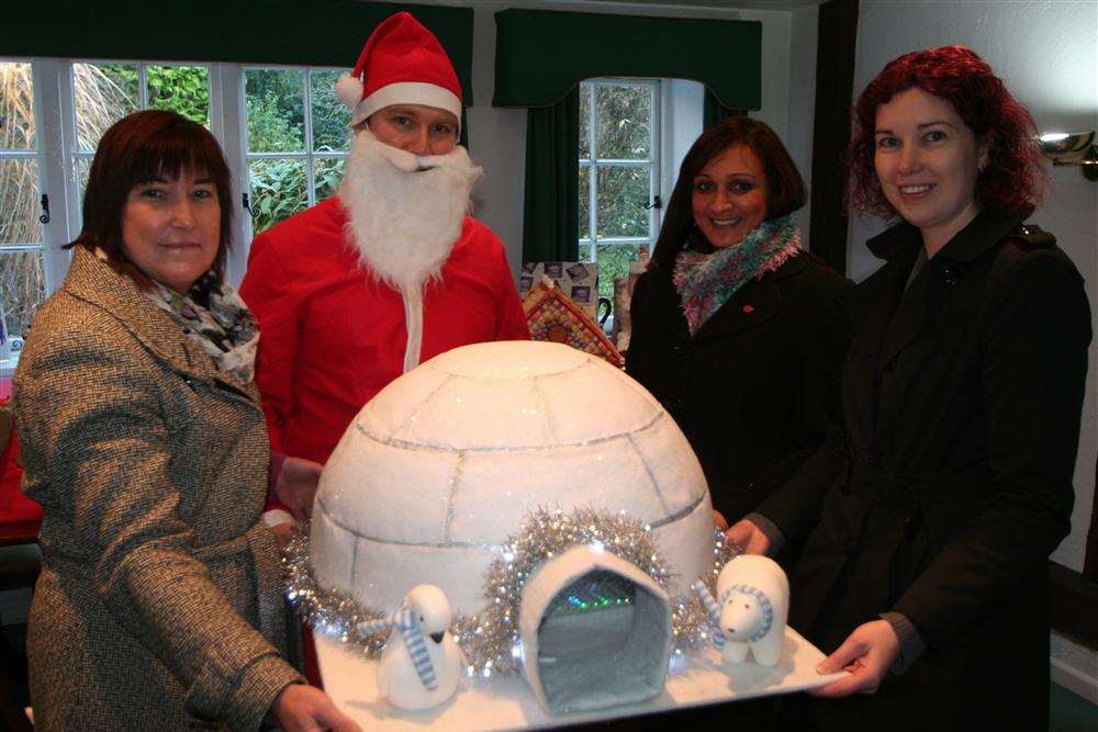 Dovetail Services, a Kent Science Park firm, which won a competition to design a Christmas hamper for Demelza House.