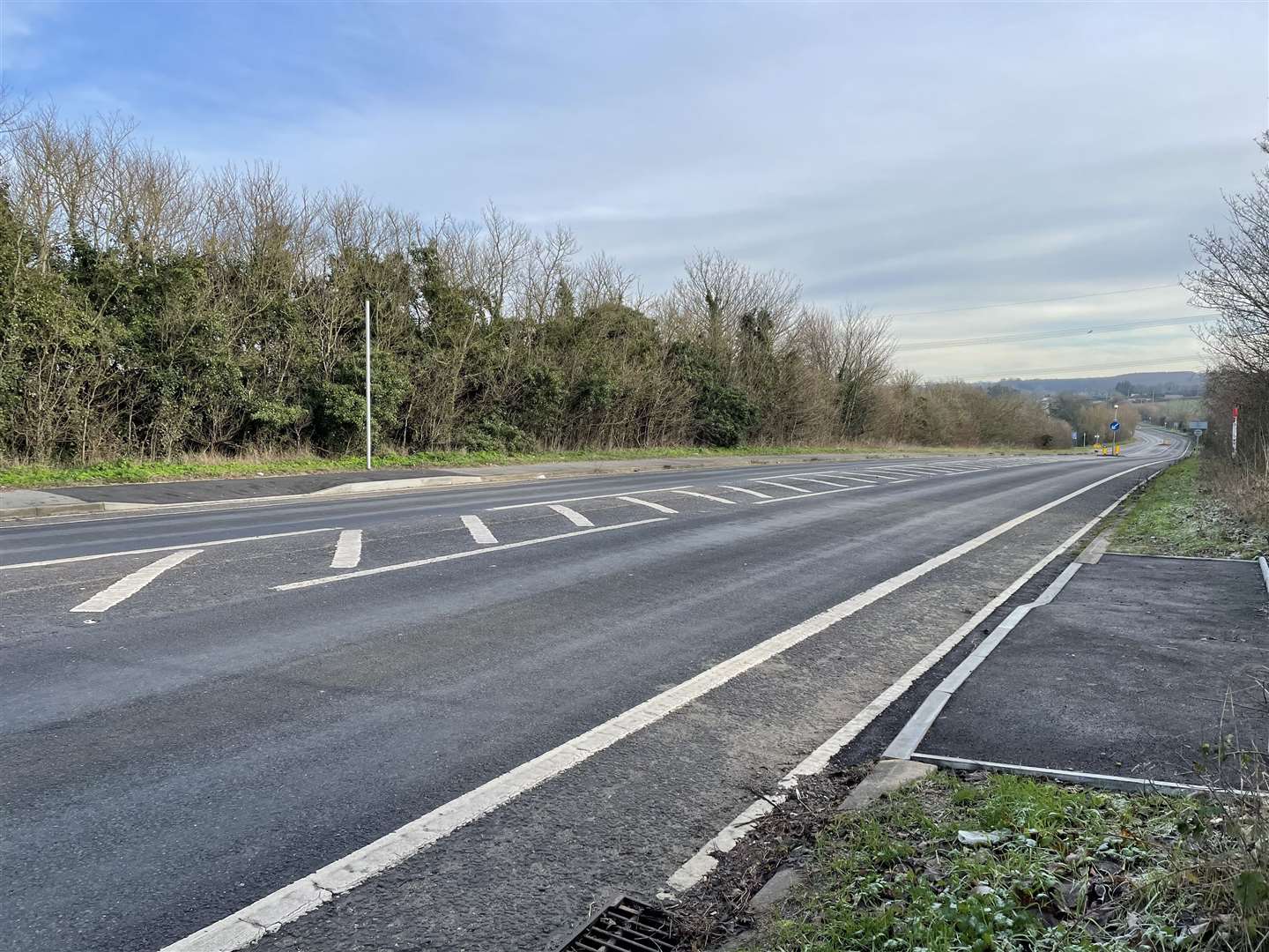 Pavements have been re-paved along the grass verge