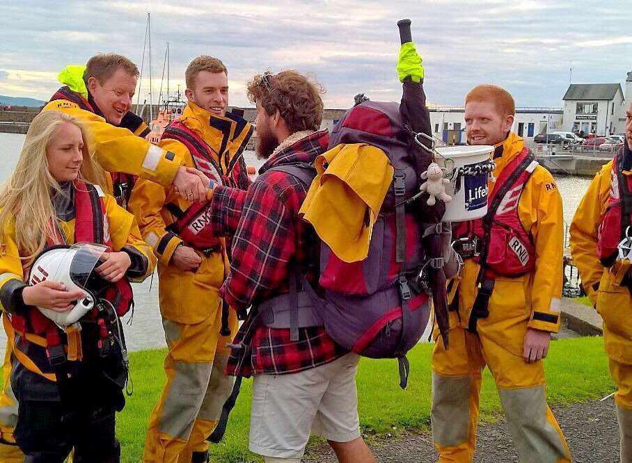 Alex meeting volunteer crew at Portrush lifeboat station, Northern Ireland