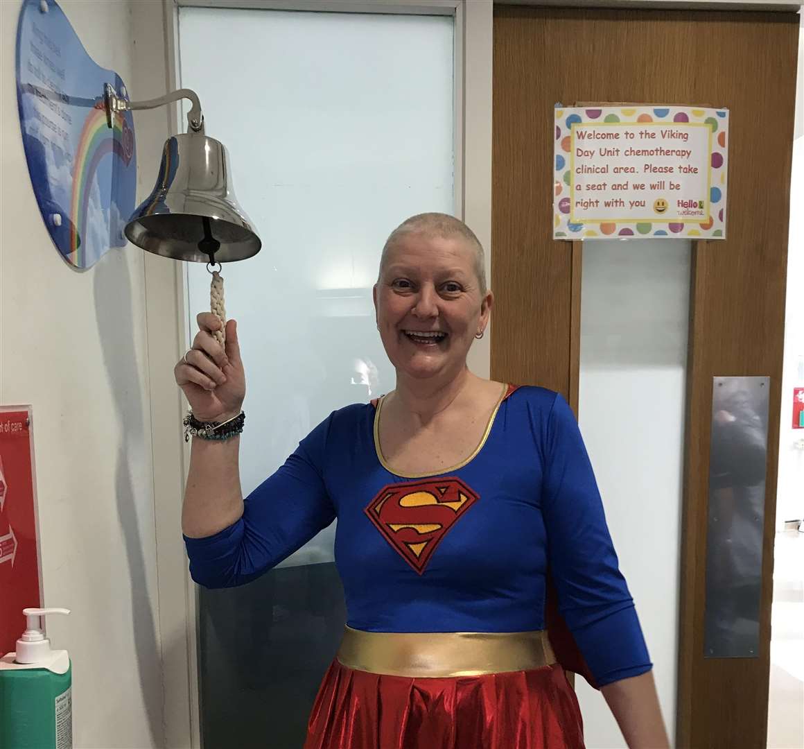 Shirley Ridge, from Birchington, rings the chemotherapy bell at the QEQM in Margate to mark the end of her breast cancer treatment. Picture: EKHUFT (7219117)