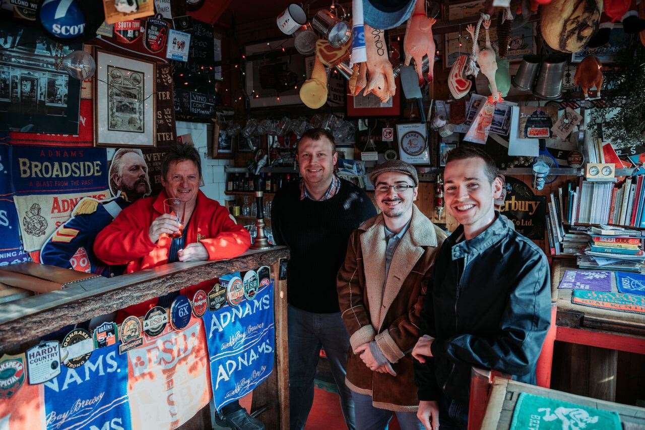 Syd Heather (far right) with the co-creators of his film, Dan Eycott and James Coyne, inside the Butcher's Arms with landlord Martyn Hillier. Picture: Pixelform Studios