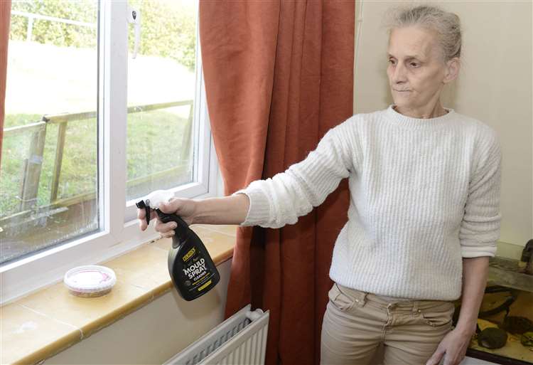 Jackie Chambers has damp problems with her home and uses anti-mould spray all the time
