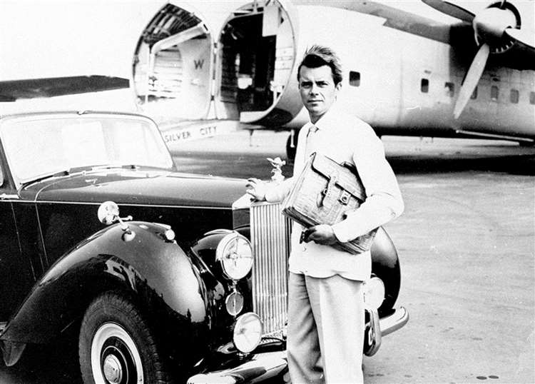 Dirk Bogarde - English actor and writer - taken to the tarmac of his limousine