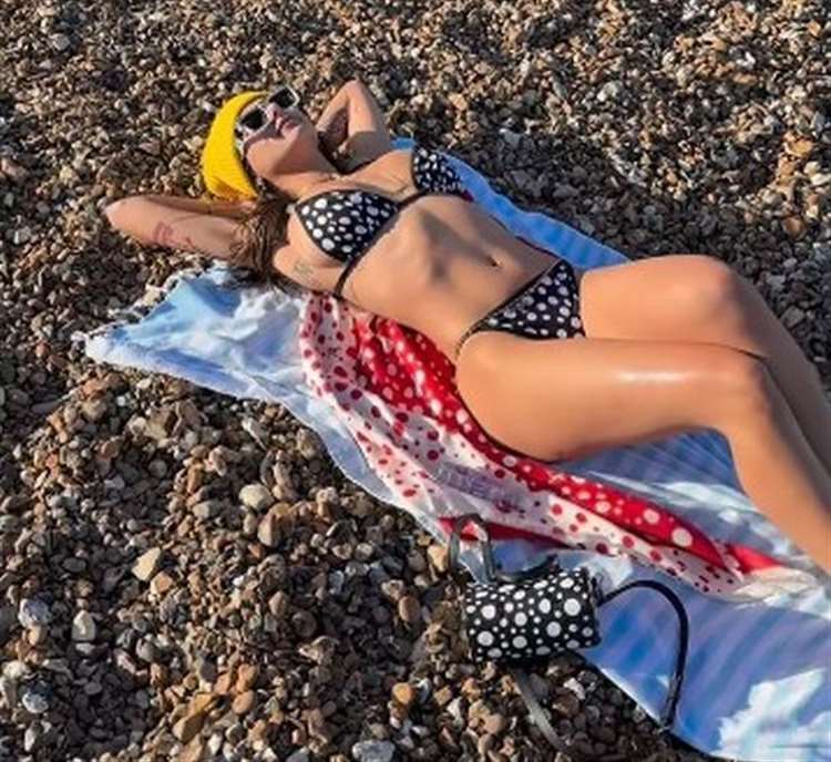 Mia Khalifa mocks Brits as she braves cold on Whitstable beach