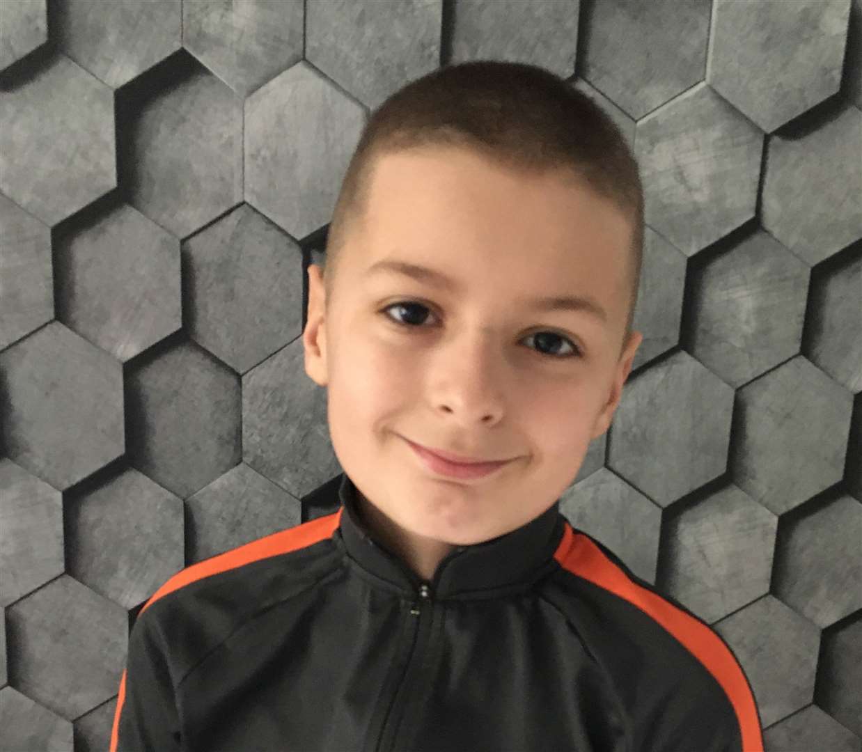 The 10-year-old after braving the shave