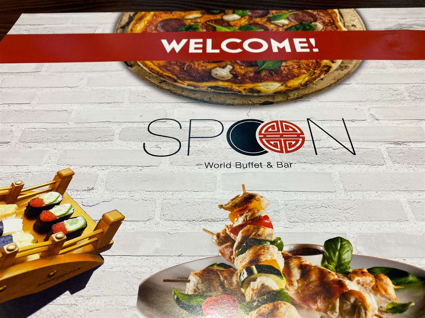 Spoon World Buffet paper placemats were at every seat around the table and were all clean. Picture: Sam Lawrie