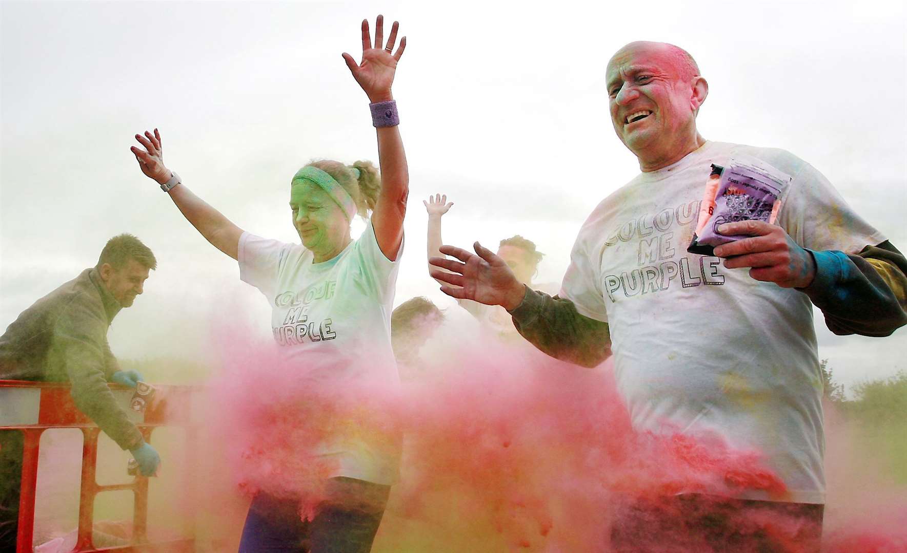 Competitors ran to raise money for the Wisdom Hospice whilst being pelted with coloured dyes at last year's event. Picture: Phil Lee
