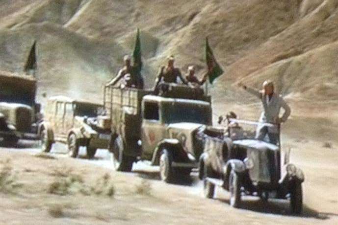 A scene from the Indiana Jones film with the Renault leading a convoy of vehicles