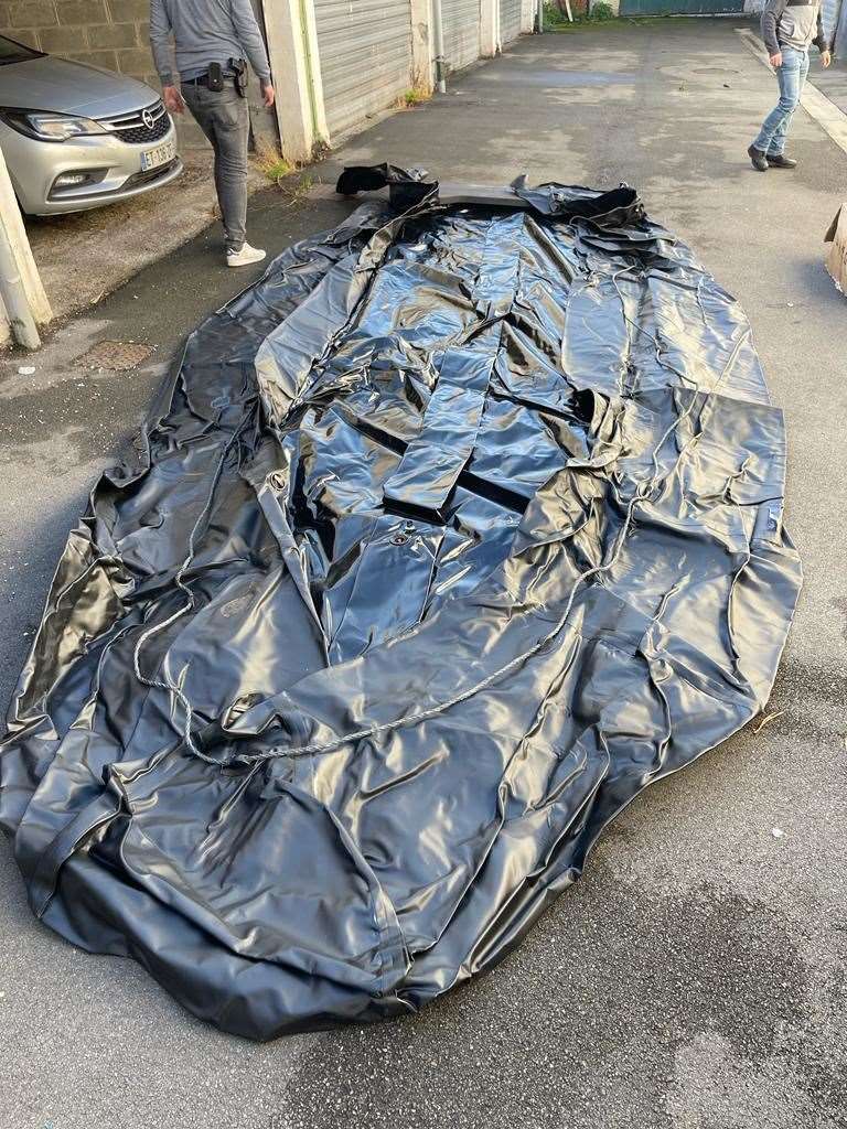 A deflated dinghy found in the lock up