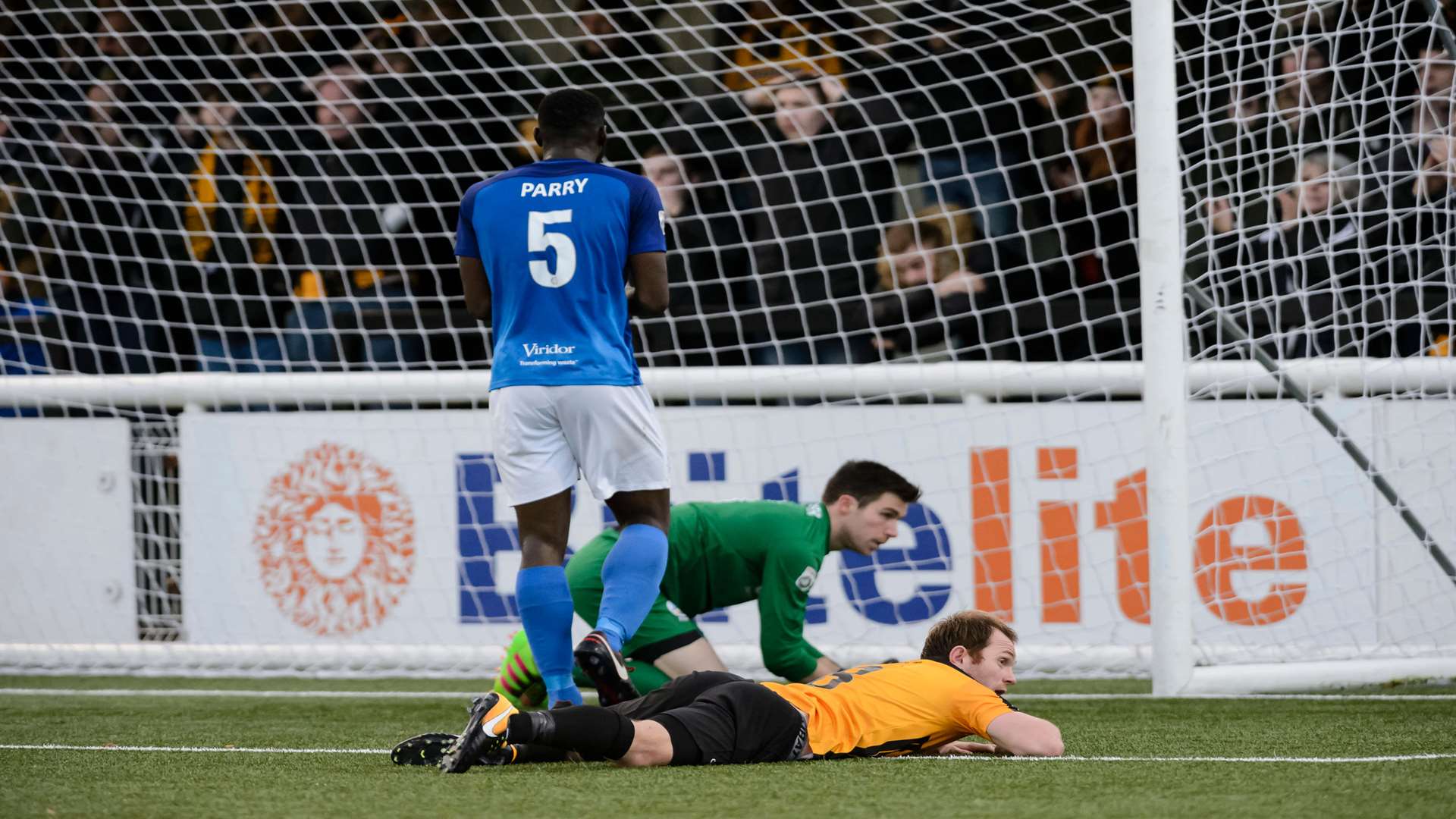 Stuart Lewis' diving header is kept out by Mitch Walker Picture: Andy Payton