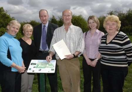 Putting pen to paper on the Downs, left to right, Cllr Jean Law, Felicity Cornish, Cllr Paul Carnell, Ashley Clark, Anna Palmer, countryside officer for Canterbury City Council and Mary Lerigo.