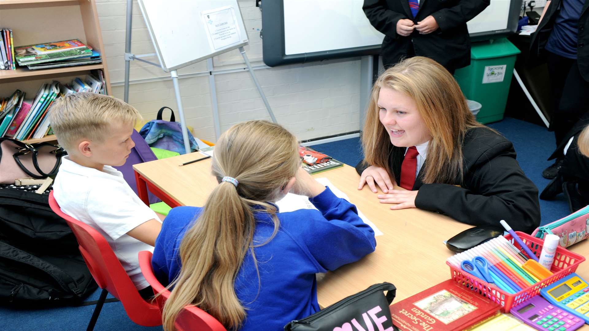 Katie Titus 14 (right), talking to year 5 pupils