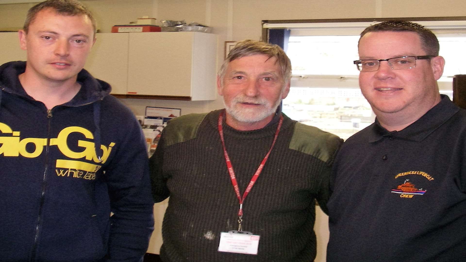 Ken Milburn, centre, with his rescuers, Sheerness Lifeboat volunteers Kris White and Mark Tucker