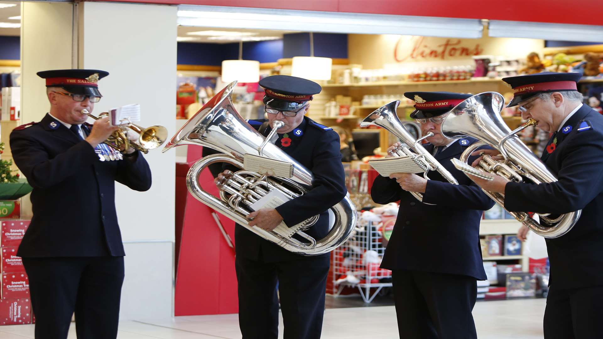 The Salvation Army band accompanied the hymns, and the bugler performed The Last Post as silence fell.