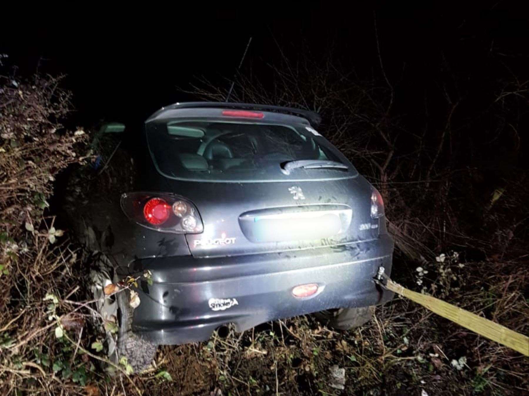 A car being pulled from a hedge near Borden Village last November. Picture: Lee Goldfinch