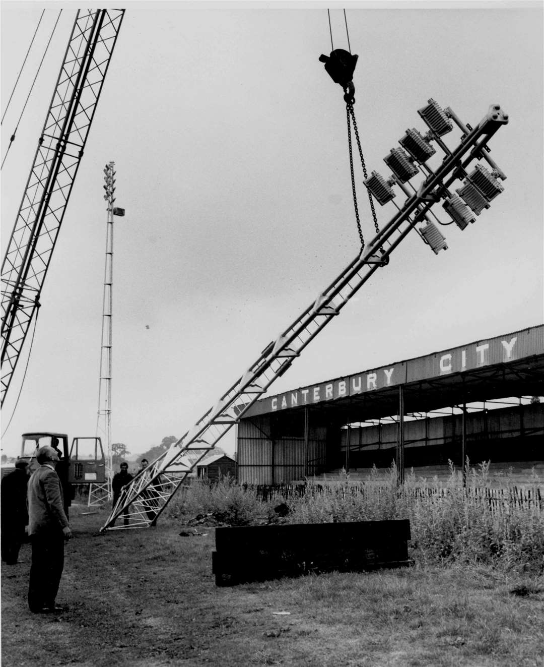 August 1964 as the last of the floodlight pylons goes up at Kingsmead Stadium. File picture from Images of Canterbury book