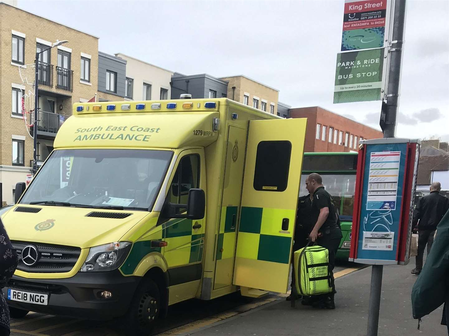 Police passed a man into the care of paramedics outside Boots in Maidstone just after 1pm
