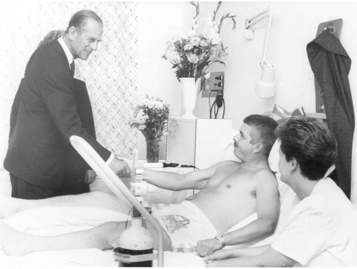 The Duke of Edinburgh visits the bedside of one of those injured in the Deal blast