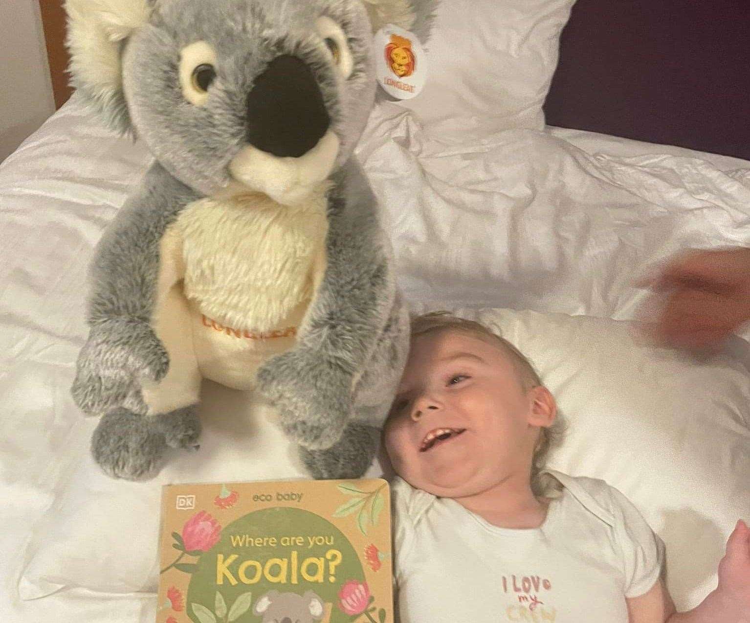 Thomas and his brothers were gifted a cuddly koala bear and other toys during their stay. Picture: Jasmine Legg