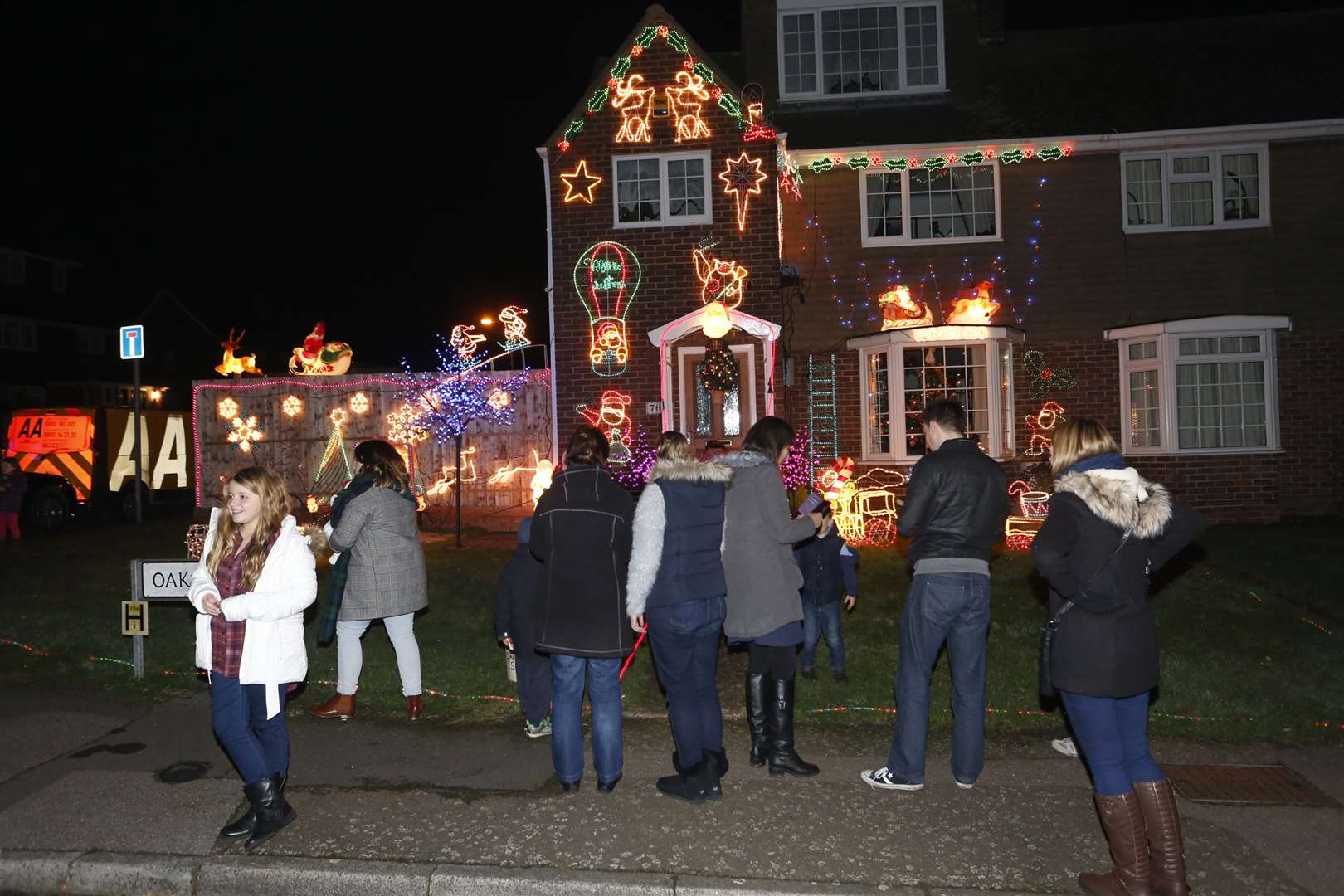 Onlookers gather to see the lights switched on