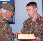 PROUD MOMENT: Private Duff receives his award