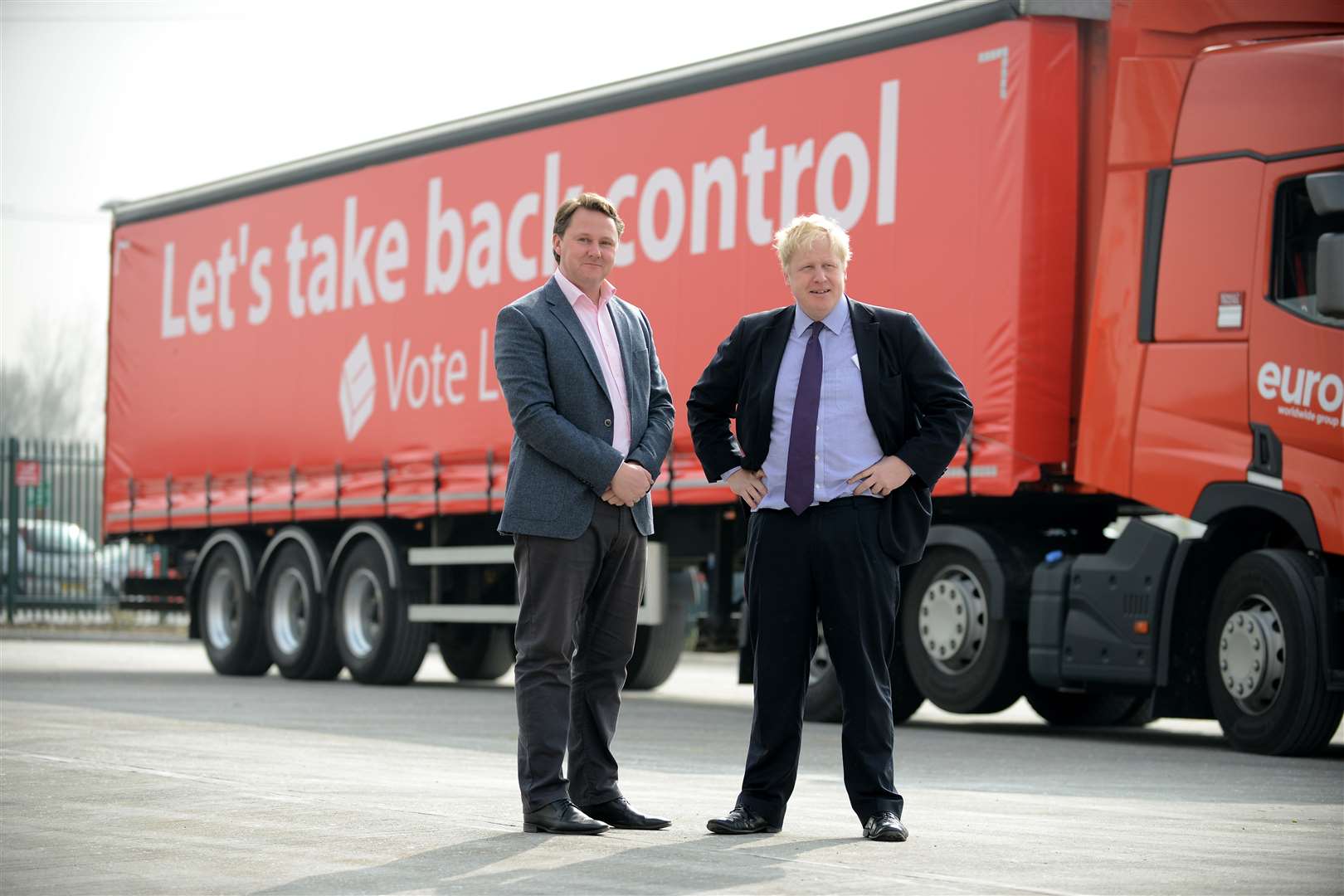 Europa Logistics managing director Andrew Baxter with Boris Johnson at the company's headquarters during the referendum campaign