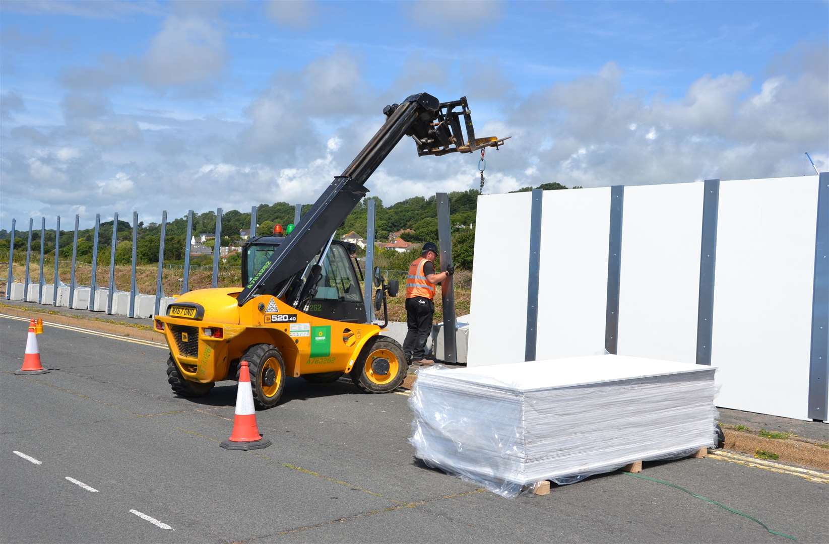 Hoardings being put up around the site of Princes Parade in Hythe. Picture: Folkestone and Hythe District Council