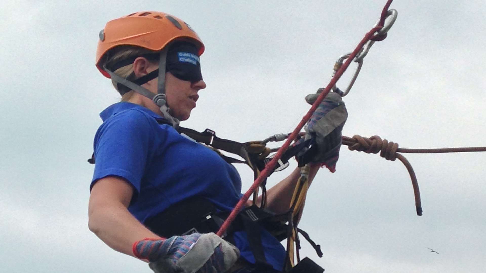 Cassie Moss of Maidstone dons a blindfold before abseiling for Guide Dogs for the Blind at the KM abseil in Folkestone.