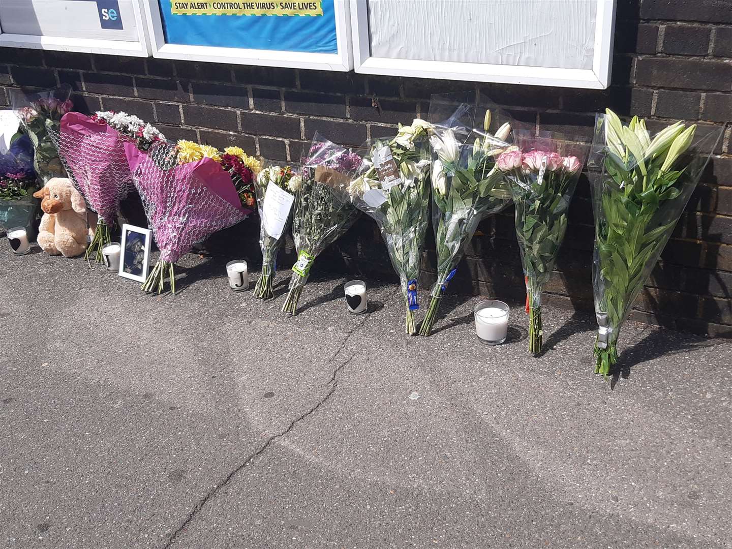 Floral tributes left outside Swanley station