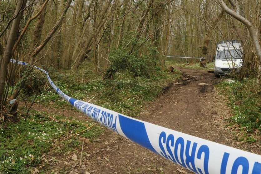 A police cordon was thrown around Kemberland Woods after the discovery of a corpse