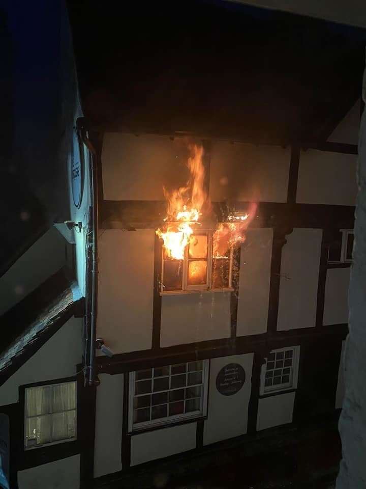 Fire bursting through the upper floor window. Picture: Tracey Crouch MP
