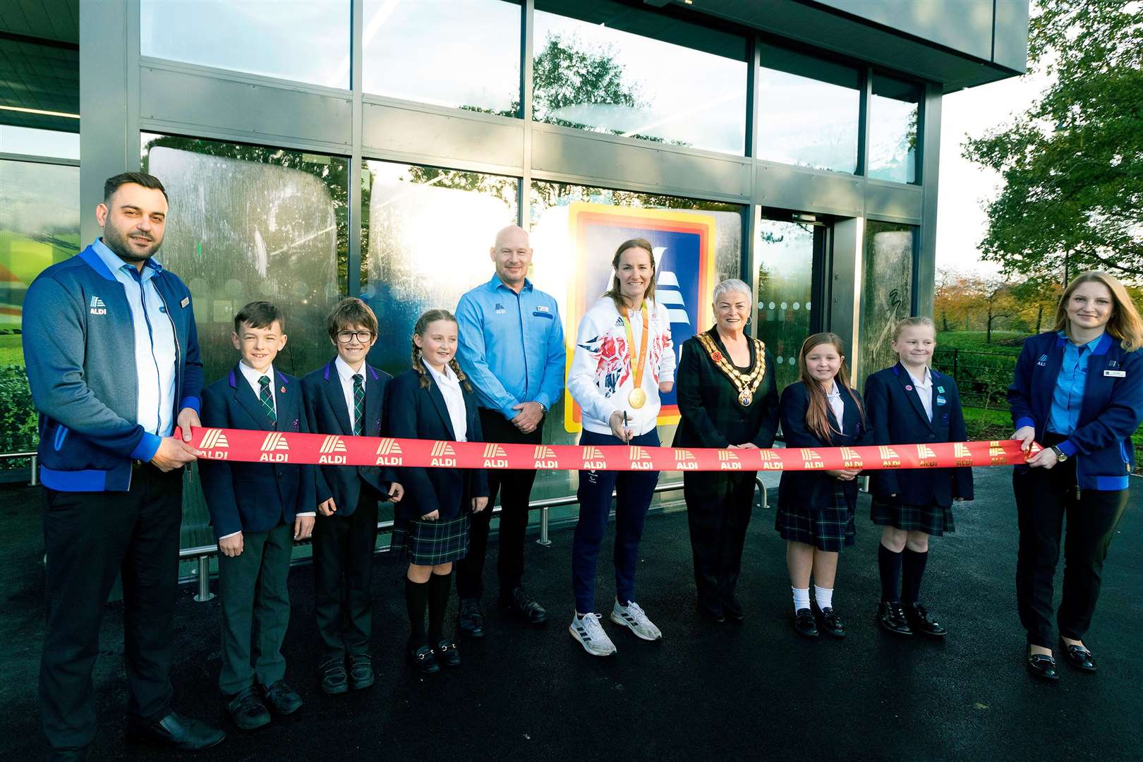 The opening of the store with staff, school children, store manager Lee Cowell, Paralympics GB Athlete Claire Cashmore and Sue Bell, Mayor of Tonbridge and Malling. Picture: McCann