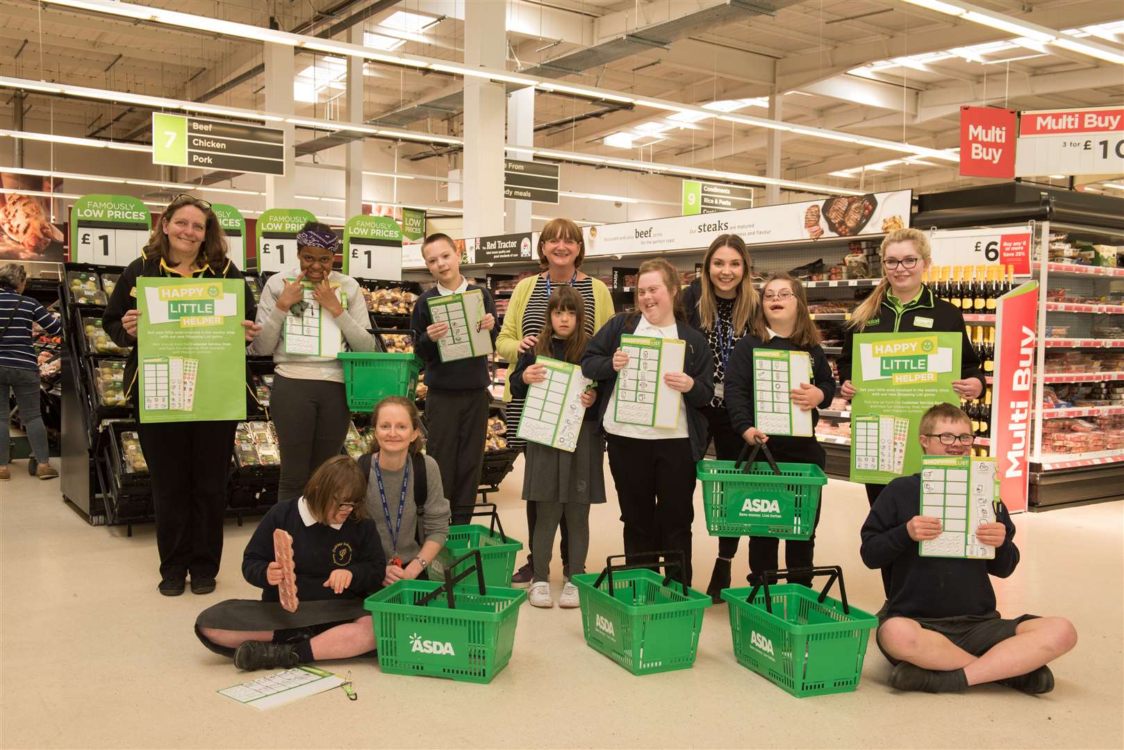 Pupils try out the Makaton boards at Asda in Tunbridge Wells (8384842)