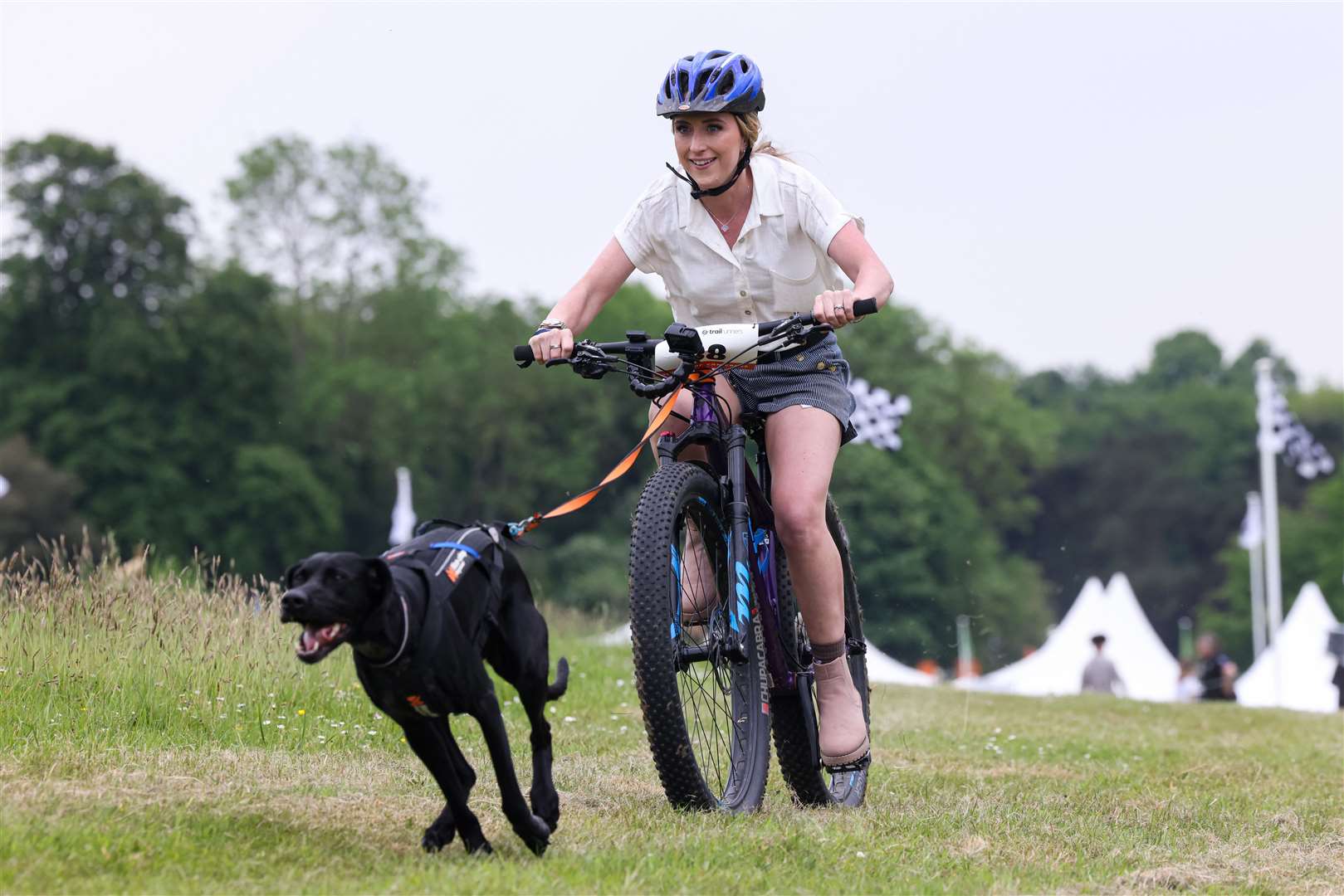Dame Laura Kenny takes part in CaniBike at Goodwoof 2024 (Matt Alexander Media Assignments/PA)
