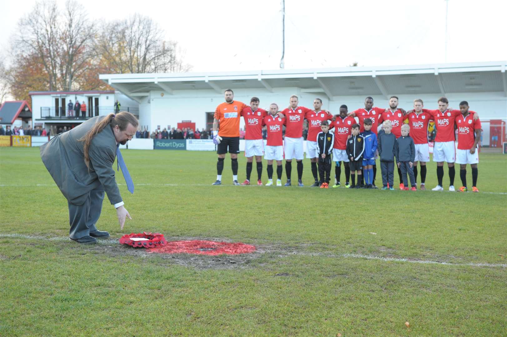 Vince Maple (Lab) laid down the wreath on the centre spot before the match.