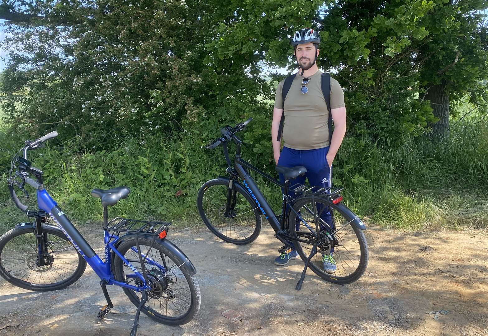 Standing with the eBikes we used