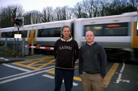 Chris Hoare, right, and Roger Chandler who pushed the stricken car and driver off the level crossing