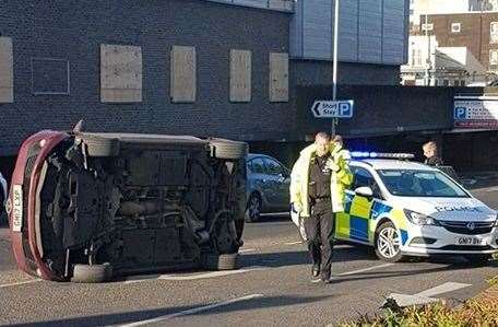A car overturned outside the Britton Farm car park, Gillingham. Picture: Bee Sage