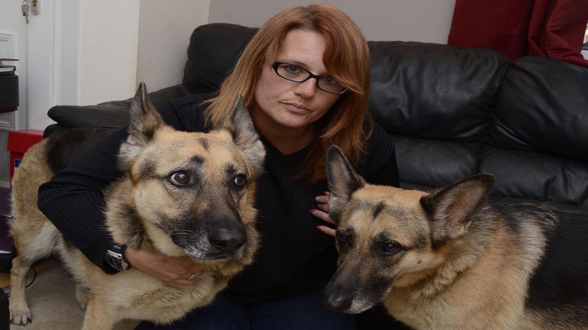 Alexis Robertson with her two German shepherds, Jasmine and Charlie. Picture: Paul Amos