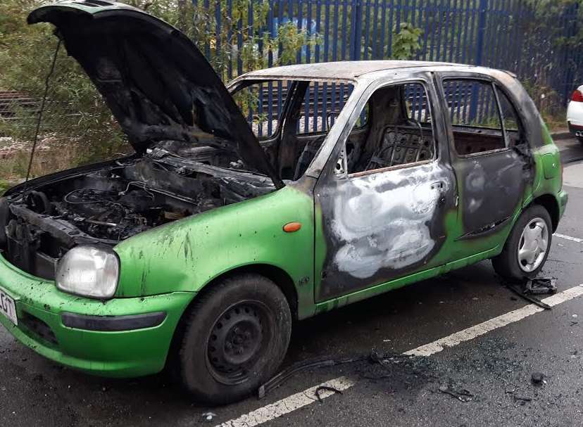 This lime green Nissan Micra was found on fire at Canterbury East station