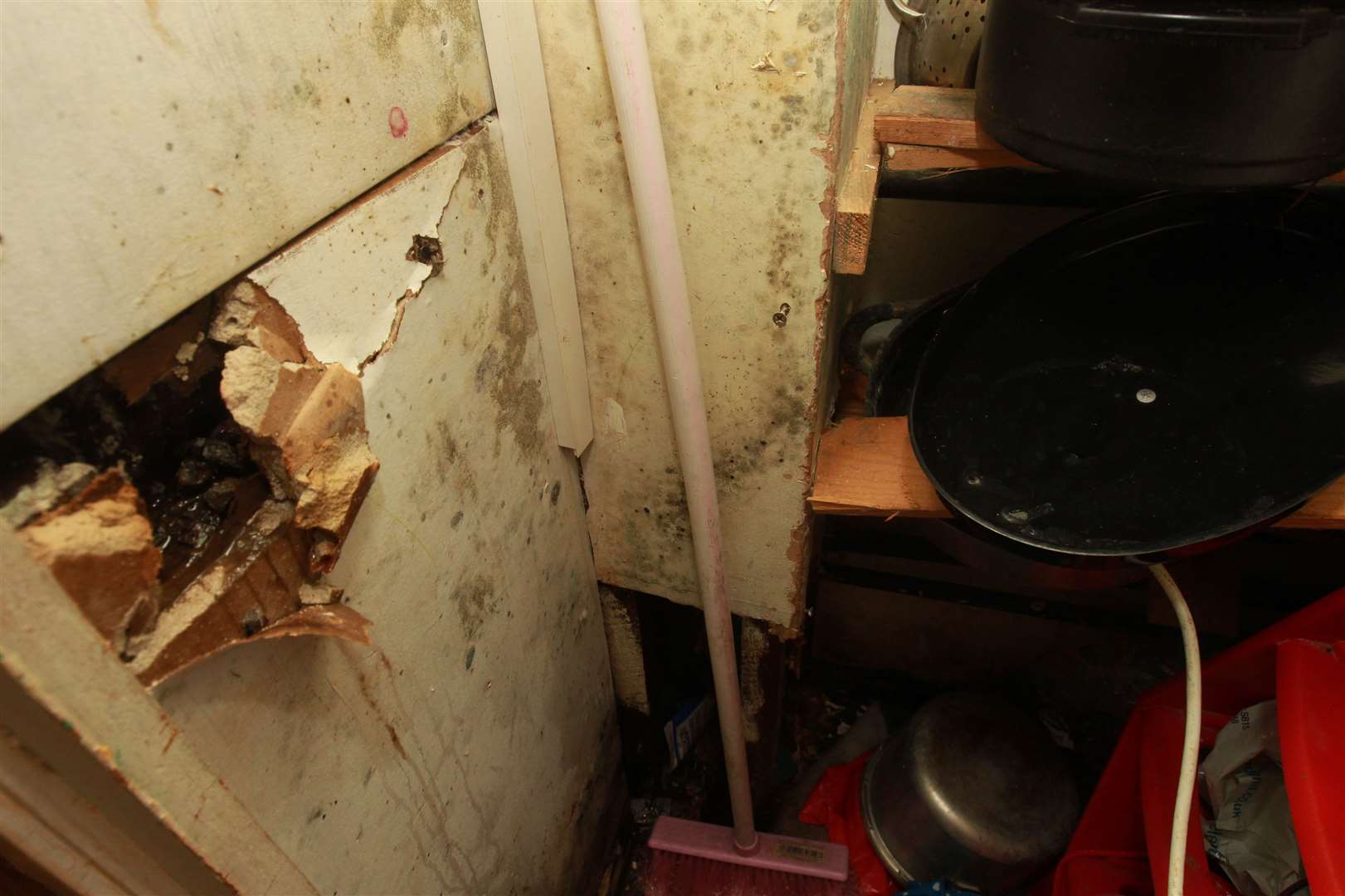 Stephen Care and Trudy Arslan are concerned over a leak in Newlyn Court, Maidstone. Picture: John Westhrop. (11079376)