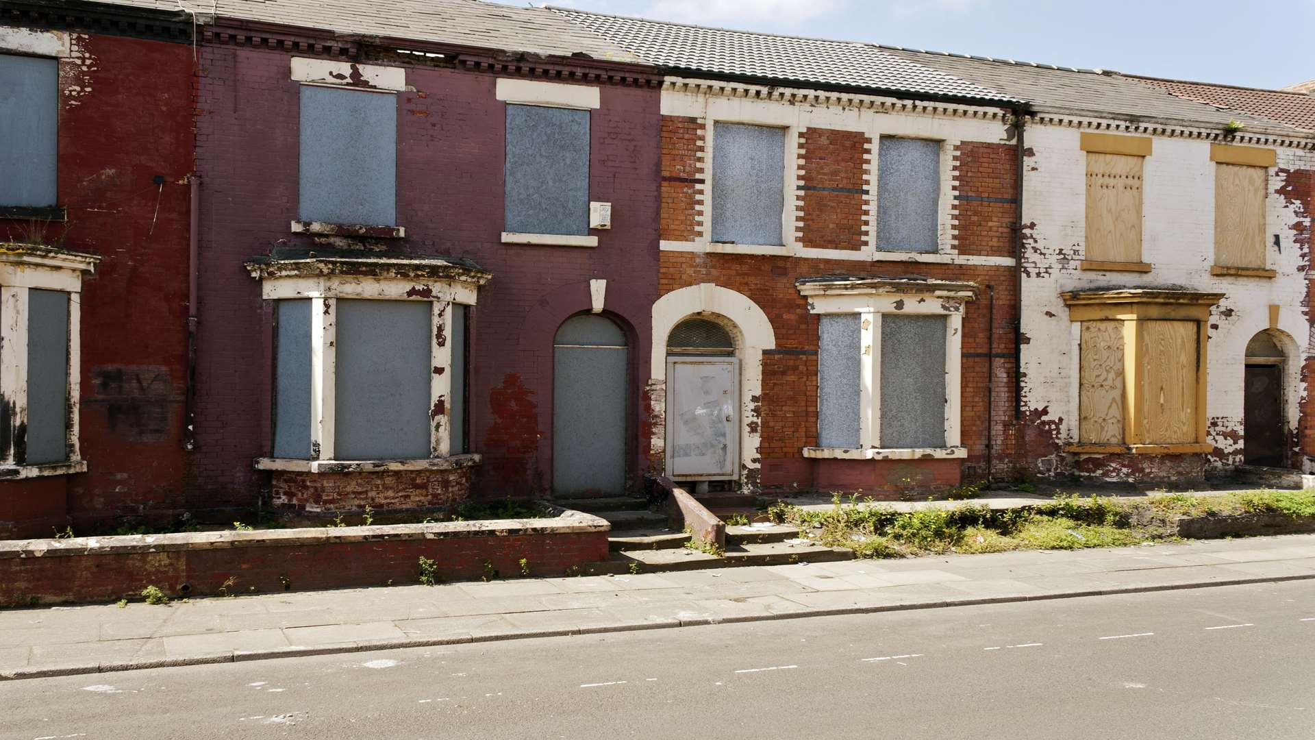 Boarded up homes. Stock image