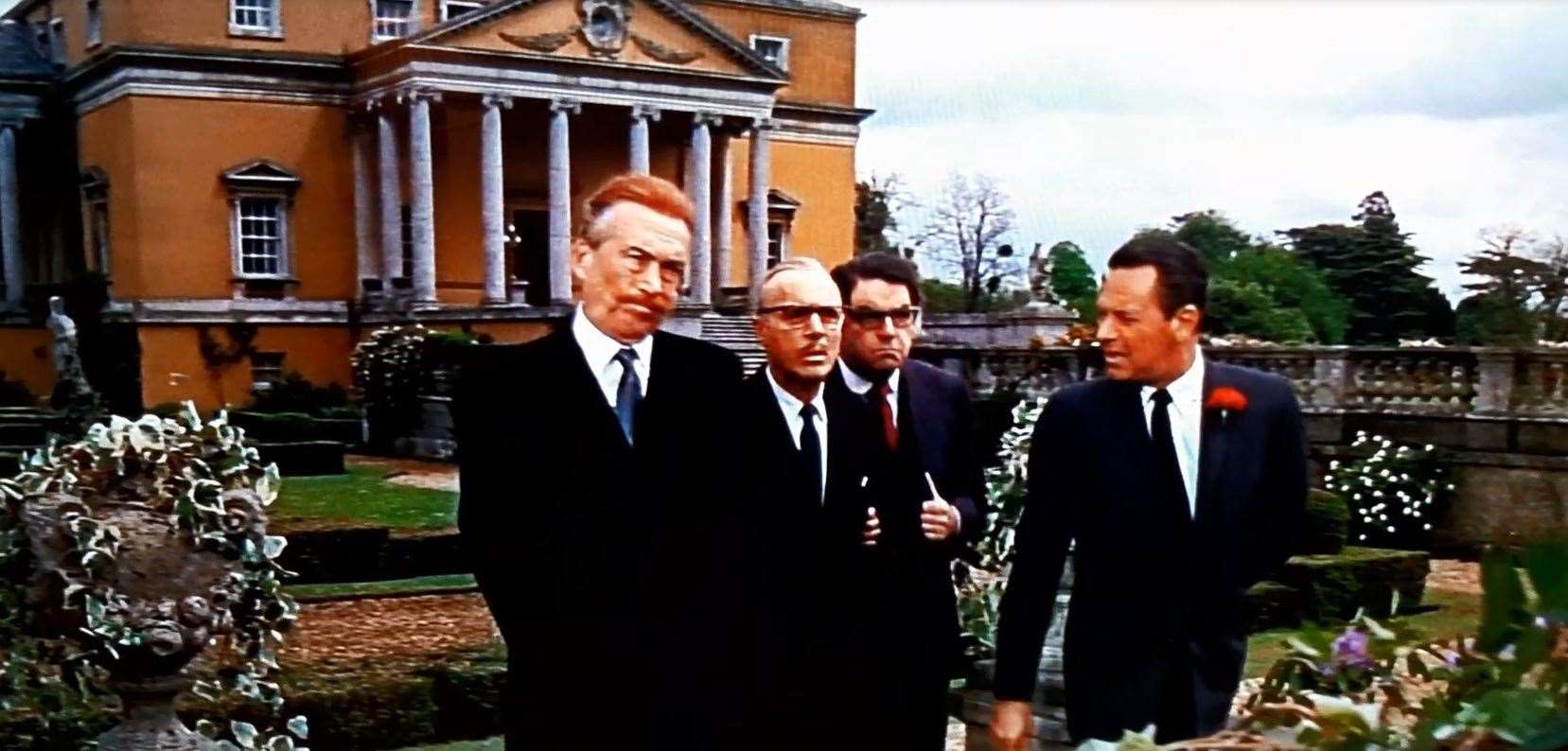 The heads of the Secret Service agencies played by John Huston, Charles Boyer, Kurt Kasznar and William Holden gather at Mereworth Castle