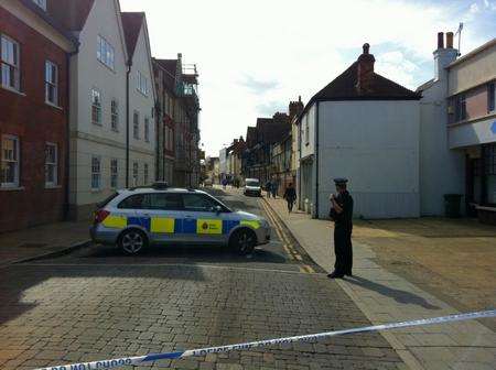 Police at the scene in Broad Street, Canterbury, where the suspicious package was found