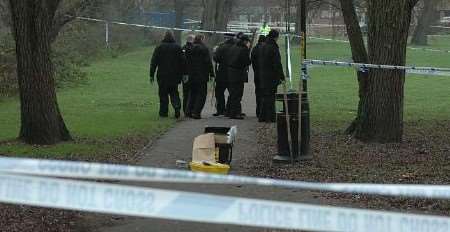 Police searching for clues near the spot where the assault happened. Picture: DAVE DOWNEY