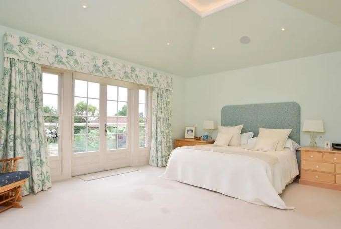 There are five bedrooms, including a master suite. Picture: Fine and Country
