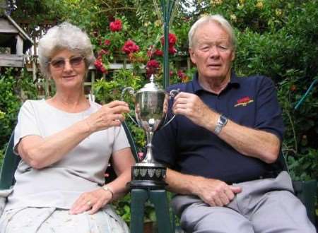 Ken and Pam Hammond with the Bob Amor Memorial Trophy, for which Faversham Town play an annual match against Sittingbourne